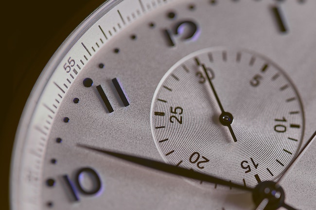 close up image of an analog watch with a secondary dial for 30 seconds